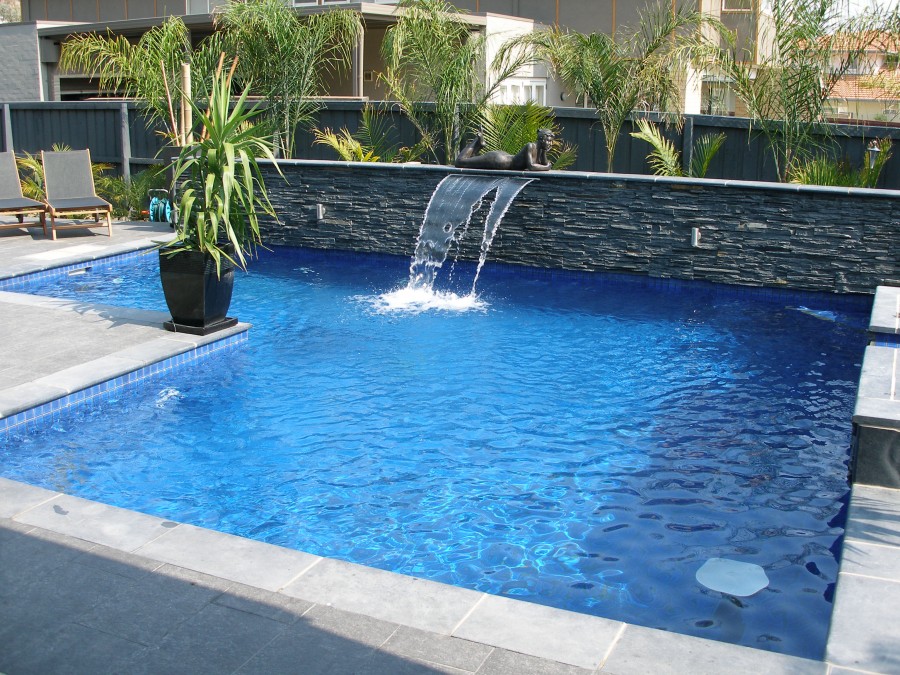Backyard Swimming Pool With Waterfall